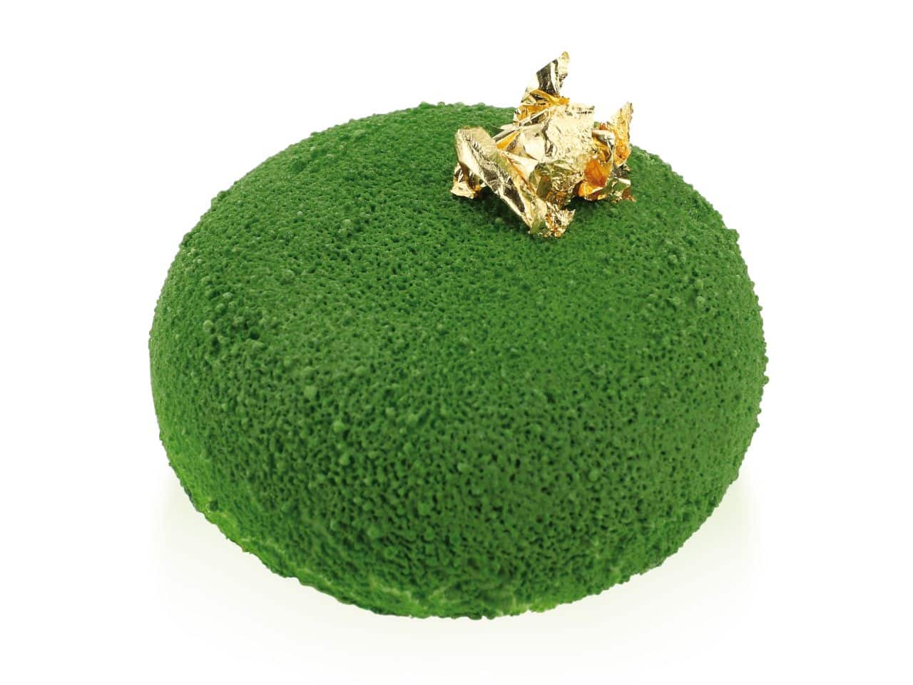 Grüne Torte mit Blattgold-Dekor