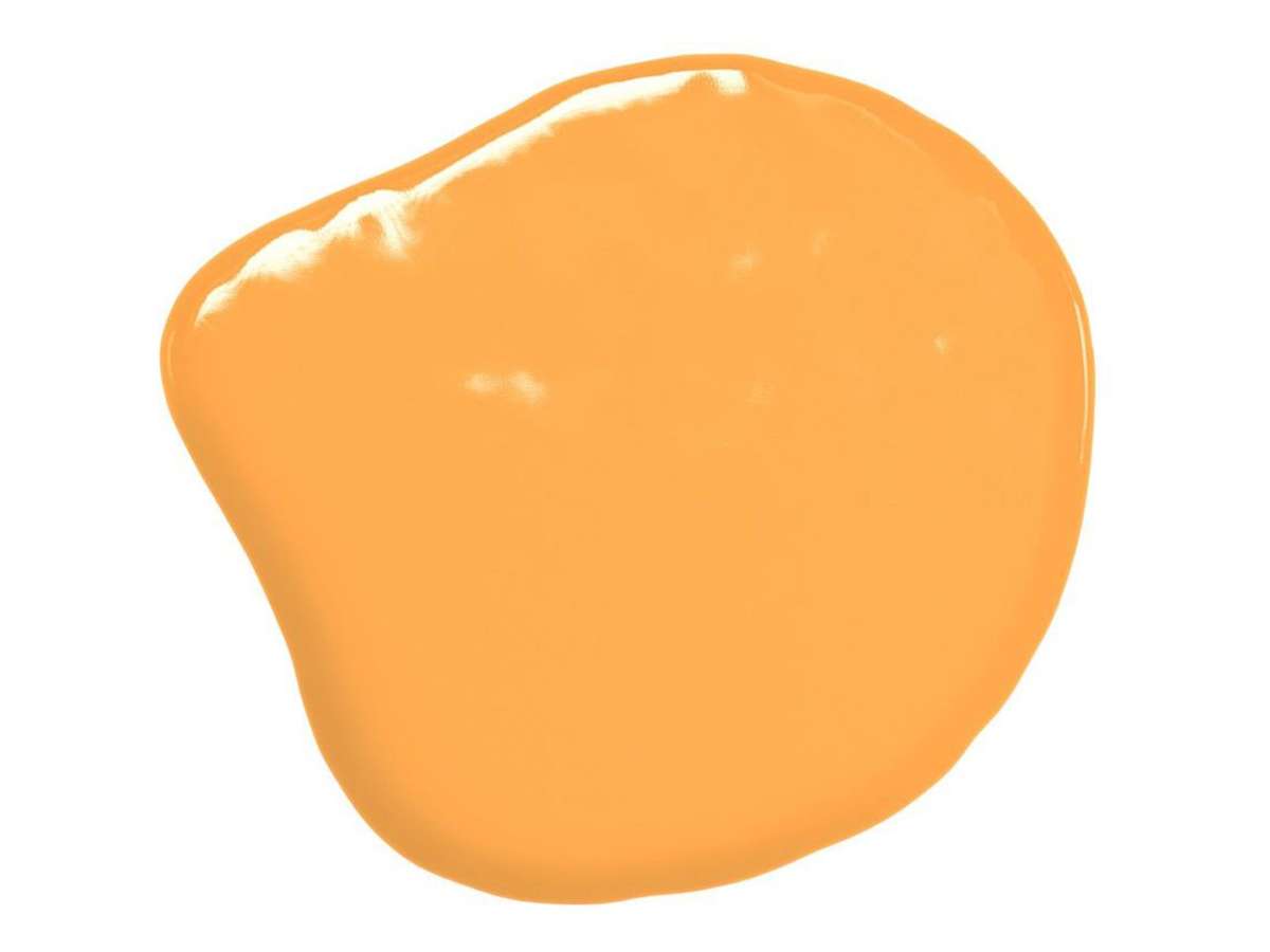 Orangefarbene Glasur auf weißem Hintergrund
