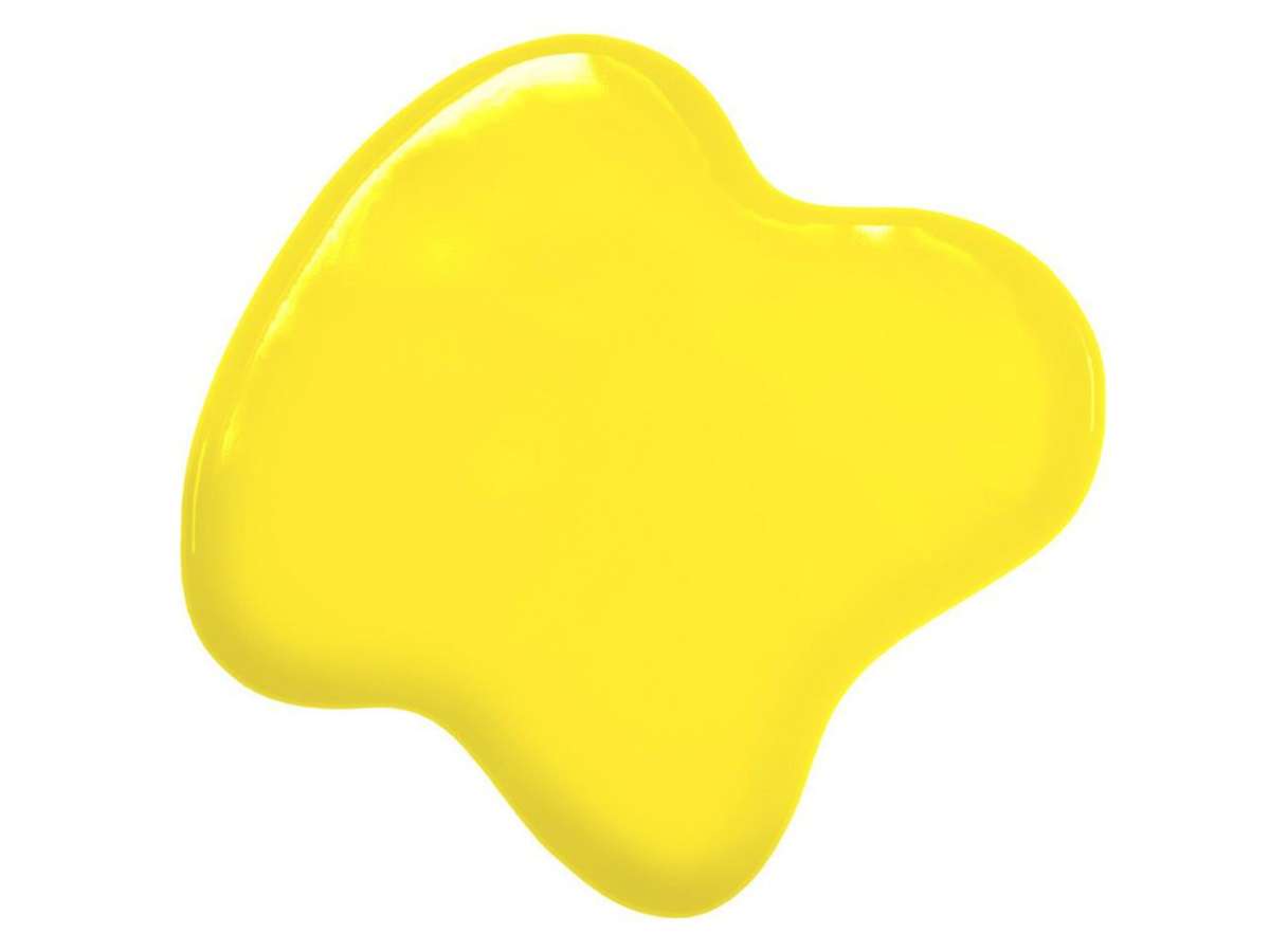 Gelber Lebensmittelfarbklecks auf Weiß