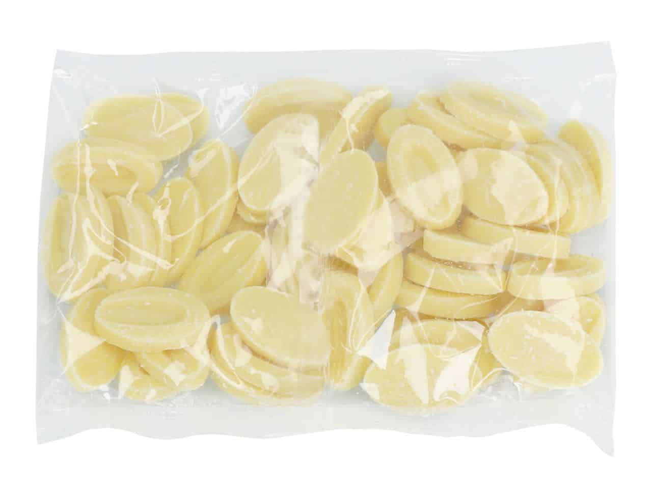 Weiße Schokoladendrops in Verpackung