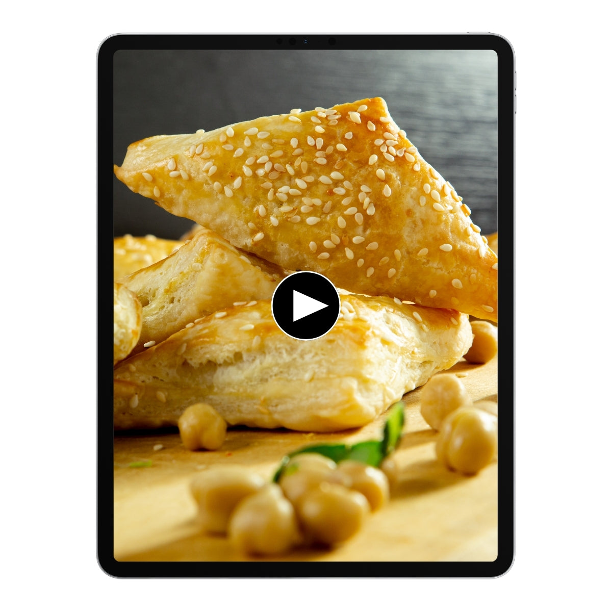 Zuchinni Kichererbsen auf einem Tablet