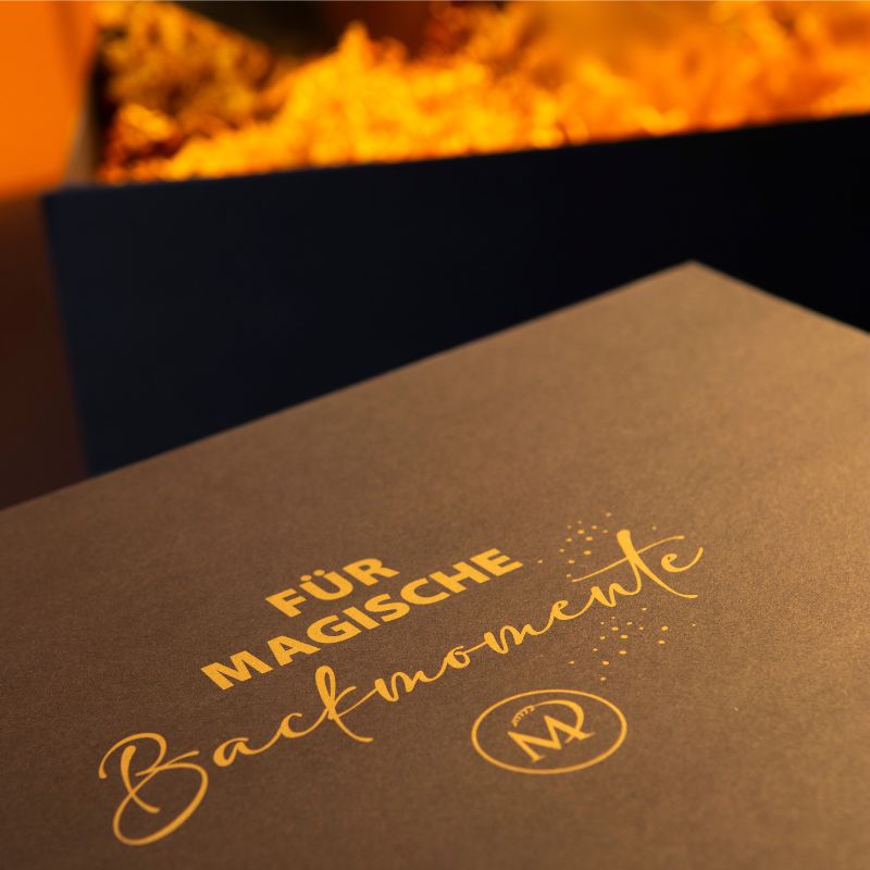 Geschenkbox mit Aufschrift Backmomente