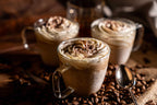 Drei Eiskaffee mit Sahnehaube